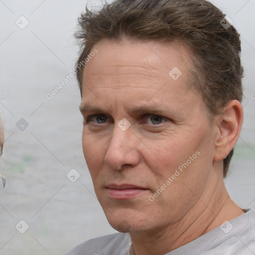 Neutral white adult male with short  brown hair and brown eyes