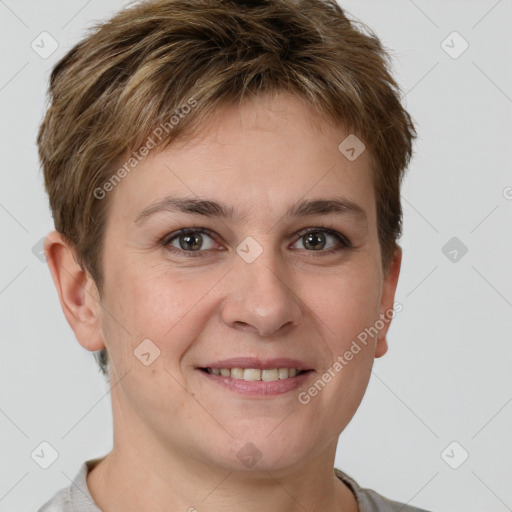 Joyful white young-adult female with short  brown hair and grey eyes