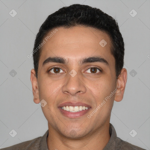 Joyful white young-adult male with short  black hair and brown eyes