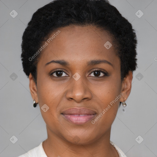 Joyful black young-adult female with short  brown hair and brown eyes