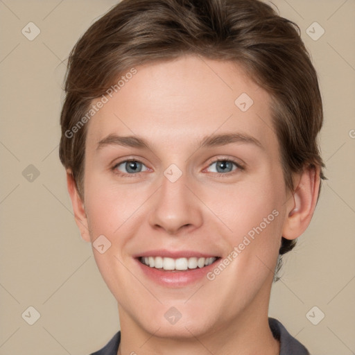 Joyful white young-adult female with short  brown hair and grey eyes