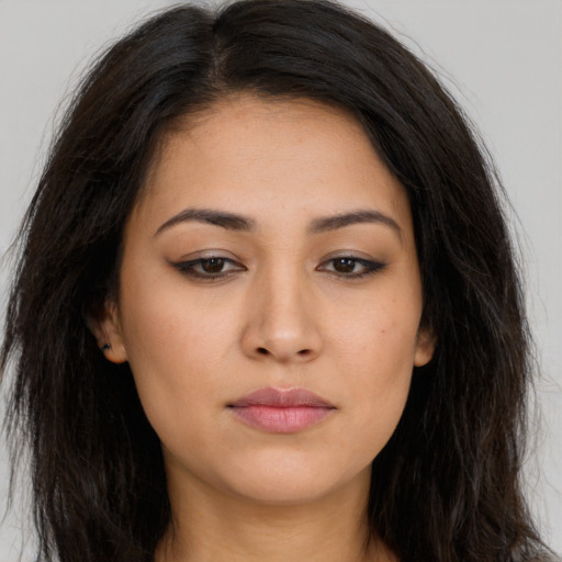 Neutral latino young-adult female with long  brown hair and brown eyes