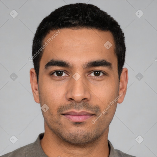 Neutral latino young-adult male with short  black hair and brown eyes