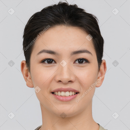 Joyful asian young-adult female with short  black hair and brown eyes