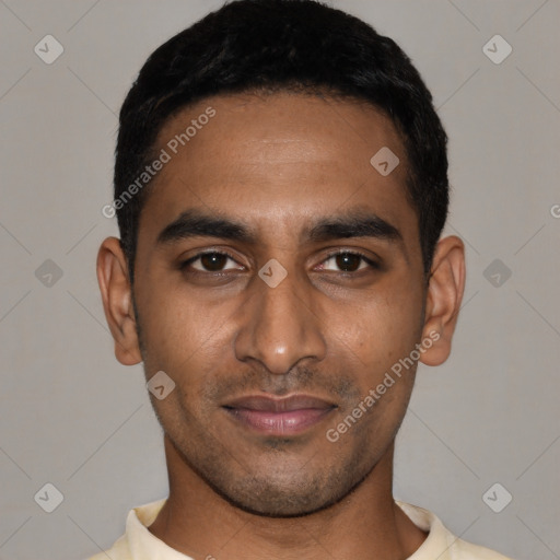 Joyful latino young-adult male with short  black hair and brown eyes