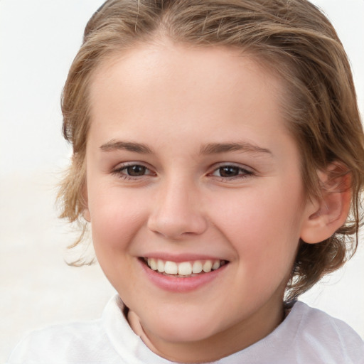 Joyful white child female with medium  brown hair and brown eyes