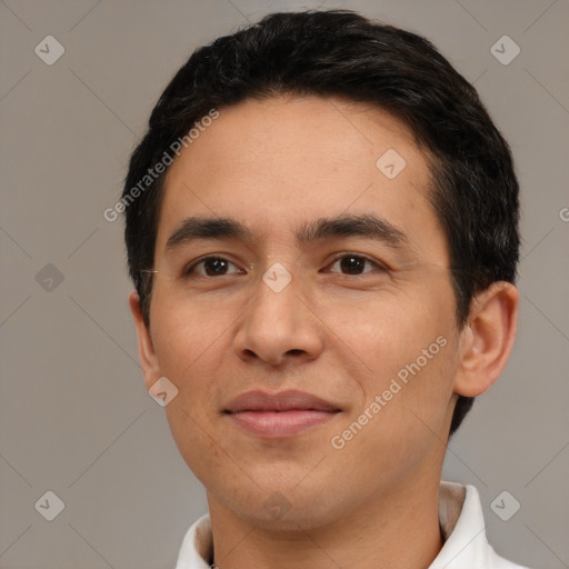 Joyful white adult male with short  black hair and brown eyes