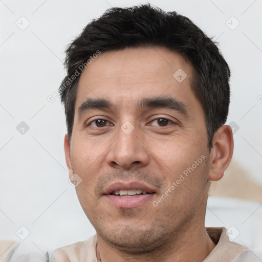 Joyful white young-adult male with short  black hair and brown eyes