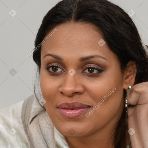 Joyful latino young-adult female with long  brown hair and brown eyes