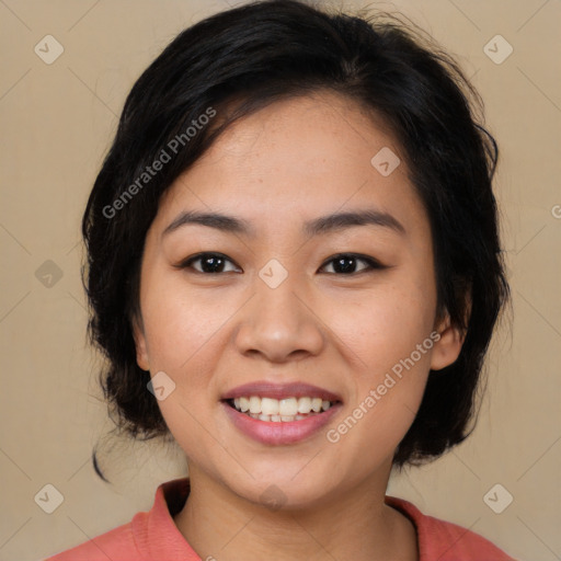 Joyful asian young-adult female with medium  black hair and brown eyes