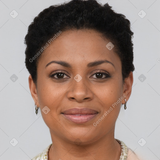 Joyful black young-adult female with short  brown hair and brown eyes