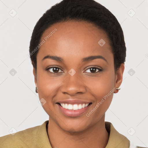 Joyful black young-adult female with short  brown hair and brown eyes