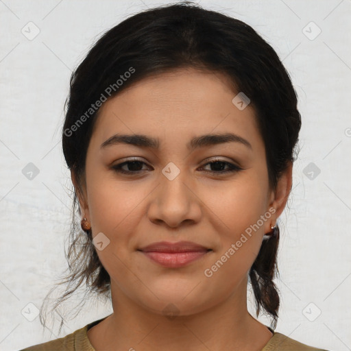 Joyful latino young-adult female with medium  brown hair and brown eyes