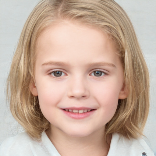 Joyful white child female with medium  brown hair and grey eyes