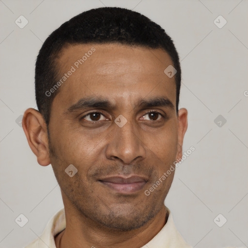 Joyful black adult male with short  black hair and brown eyes