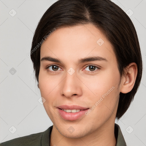 Joyful white young-adult female with medium  brown hair and brown eyes