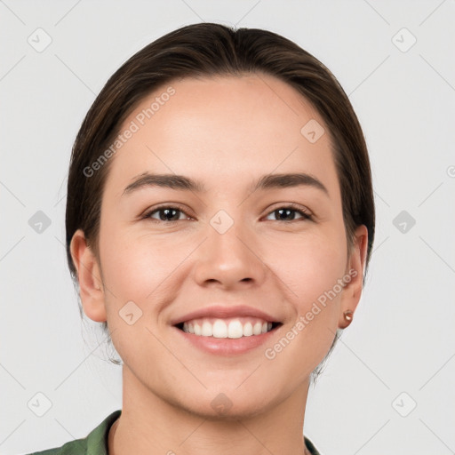 Joyful white young-adult female with medium  brown hair and brown eyes