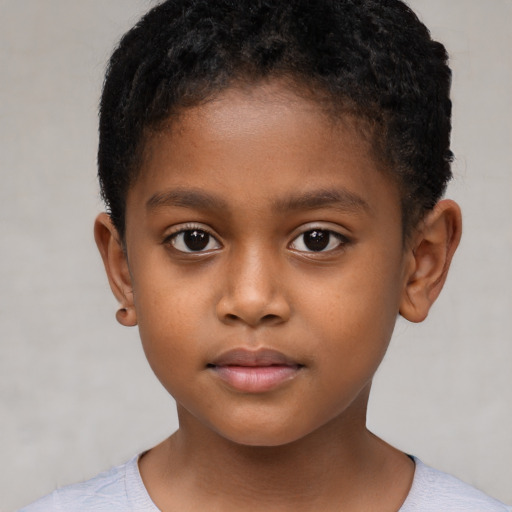 Neutral black child male with short  brown hair and brown eyes