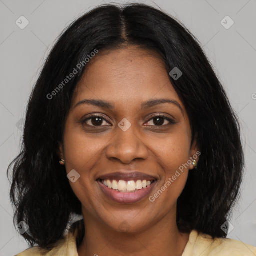 Joyful black young-adult female with long  brown hair and brown eyes