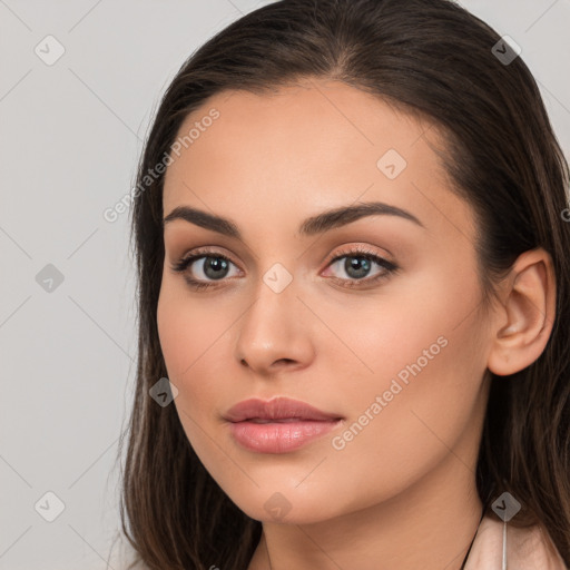 Neutral white young-adult female with long  brown hair and brown eyes