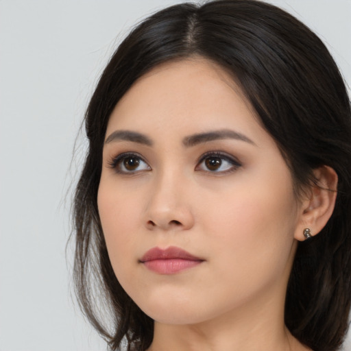 Neutral asian young-adult female with long  black hair and brown eyes