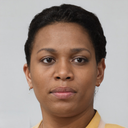 Neutral black young-adult female with short  brown hair and brown eyes