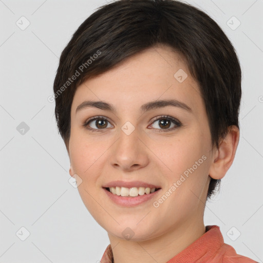 Joyful white young-adult female with short  brown hair and brown eyes