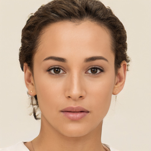 Neutral white young-adult female with short  brown hair and brown eyes