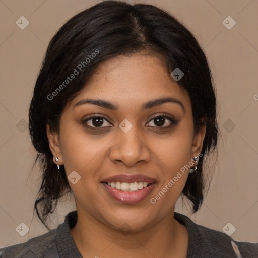 Joyful black young-adult female with medium  brown hair and brown eyes