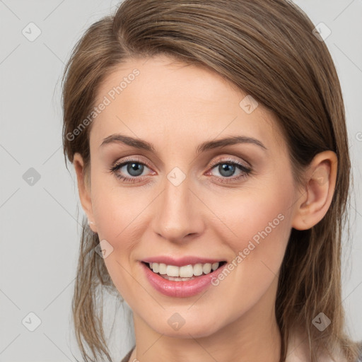 Joyful white young-adult female with medium  brown hair and grey eyes