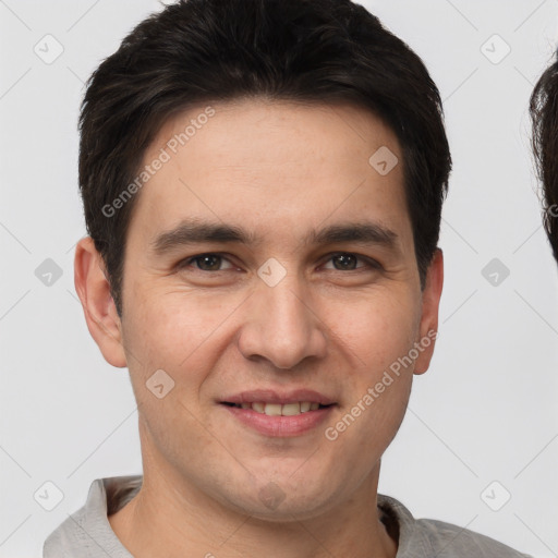 Joyful white young-adult male with short  brown hair and brown eyes