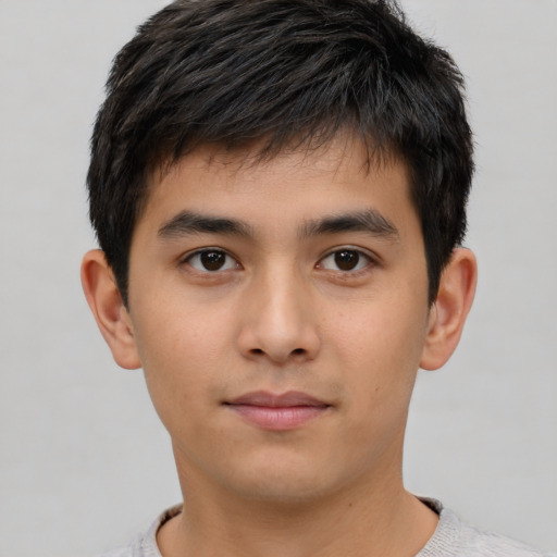 Neutral white young-adult male with short  black hair and brown eyes