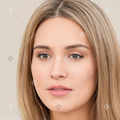 Neutral white young-adult female with long  brown hair and brown eyes