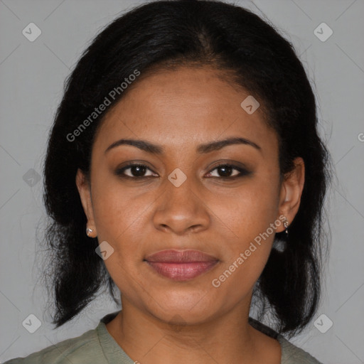 Joyful black young-adult female with medium  brown hair and brown eyes