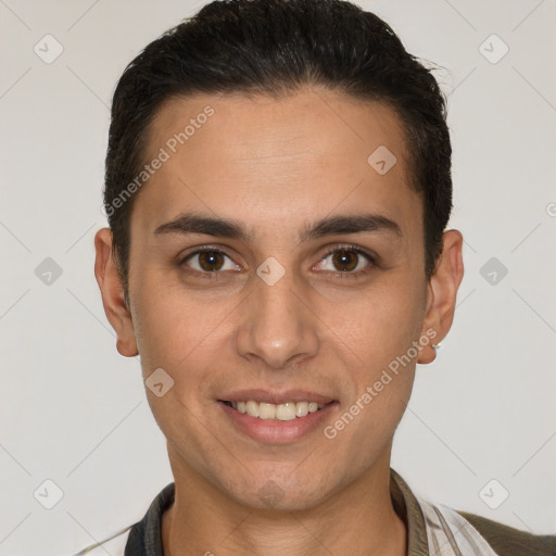 Joyful white young-adult male with short  brown hair and brown eyes