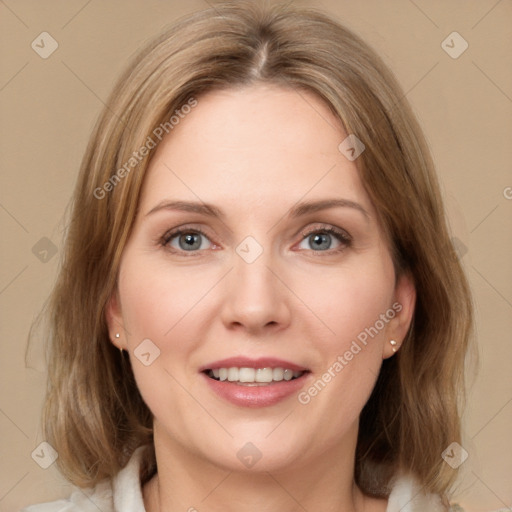 Joyful white young-adult female with medium  brown hair and green eyes