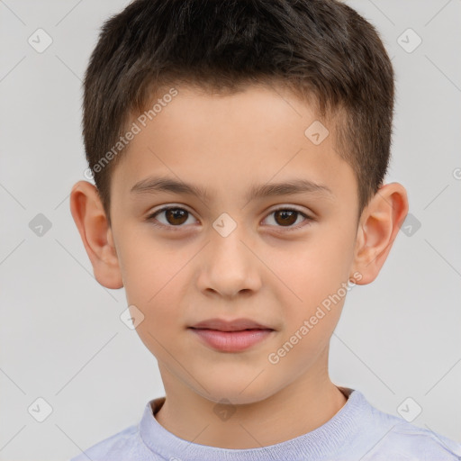 Joyful white child male with short  brown hair and brown eyes