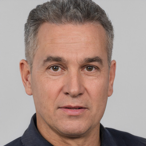 Neutral white middle-aged male with short  brown hair and brown eyes