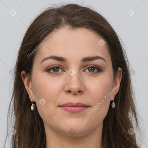 Joyful white young-adult female with long  brown hair and grey eyes