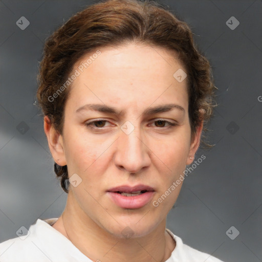 Joyful white adult female with short  brown hair and brown eyes