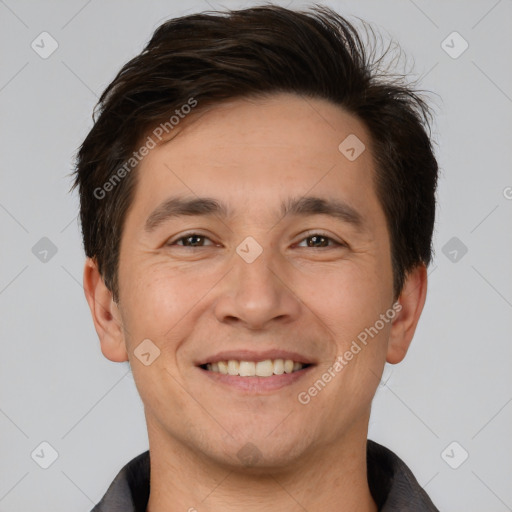 Joyful white adult male with short  brown hair and brown eyes