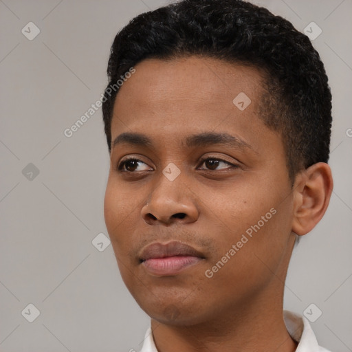 Neutral black young-adult male with short  black hair and brown eyes