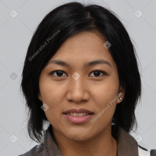 Joyful asian young-adult female with medium  black hair and brown eyes