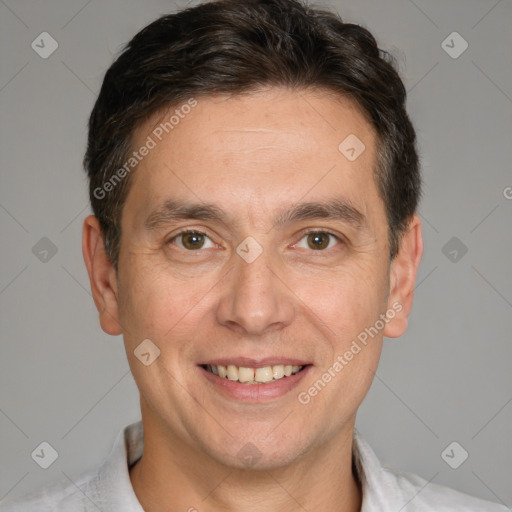 Joyful white adult male with short  brown hair and brown eyes