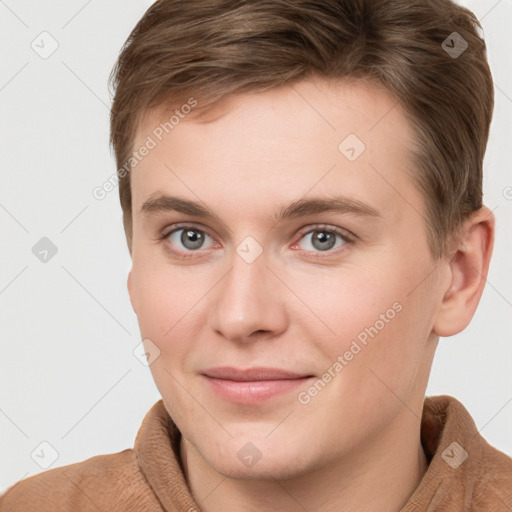 Joyful white young-adult female with short  brown hair and grey eyes