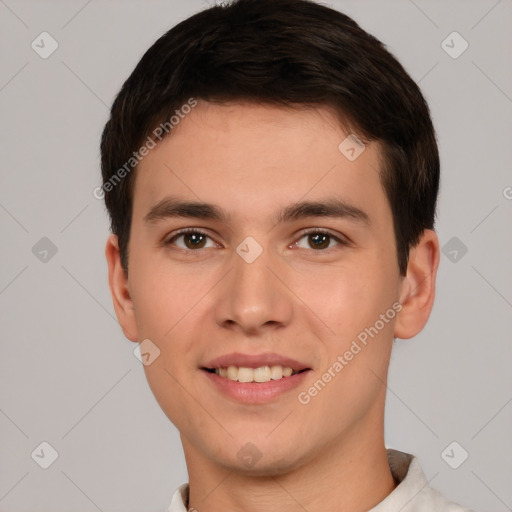 Joyful white young-adult male with short  brown hair and brown eyes