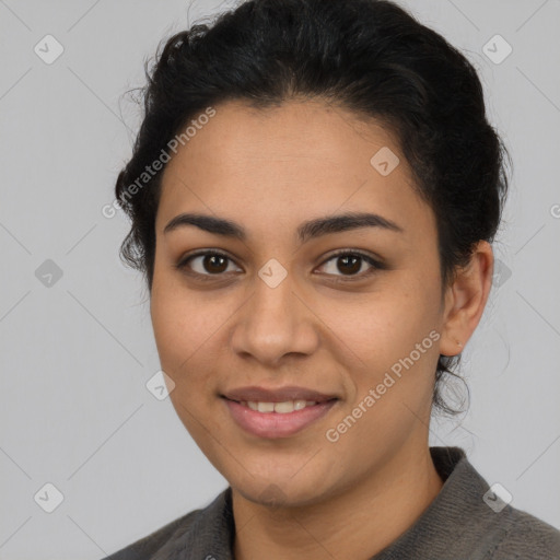 Joyful latino young-adult female with short  brown hair and brown eyes