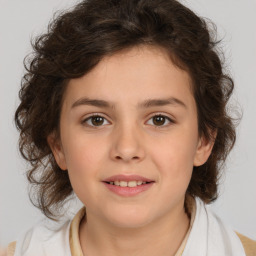 Joyful white child female with medium  brown hair and brown eyes