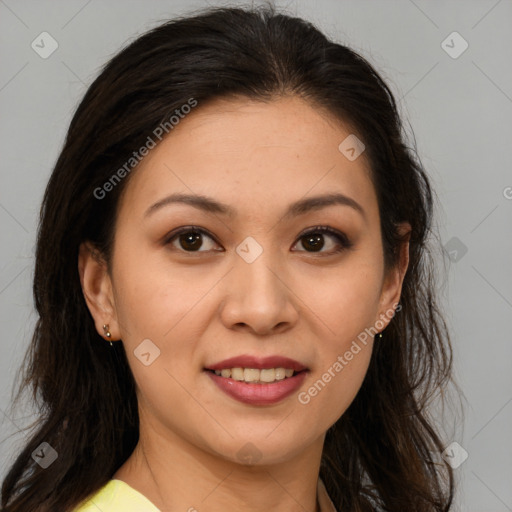 Joyful latino young-adult female with long  brown hair and brown eyes