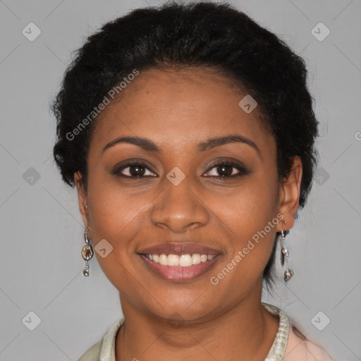 Joyful black young-adult female with short  brown hair and brown eyes